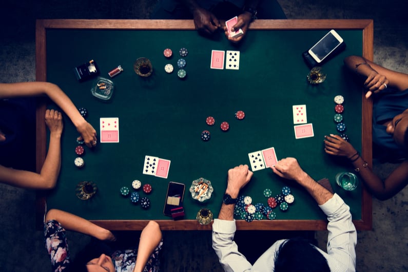 Aerial of people playing poker in casino