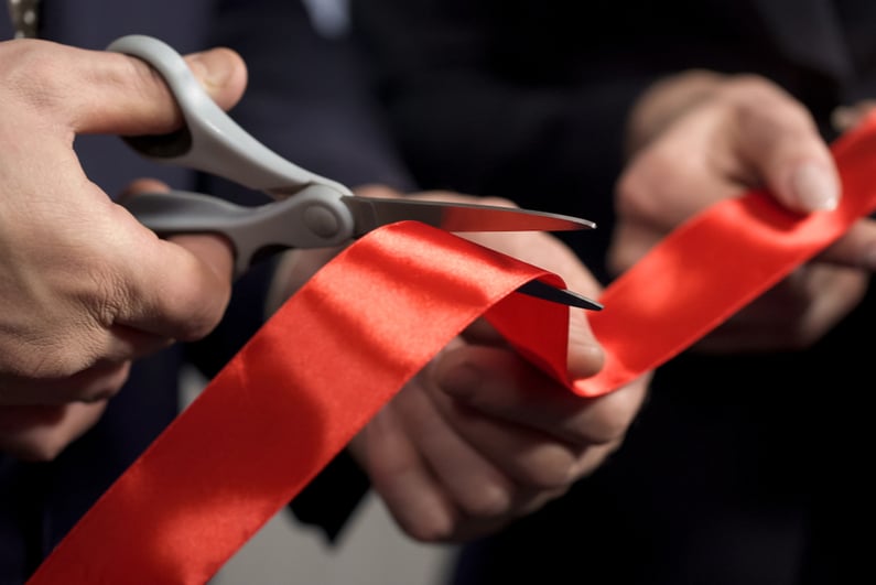 Closeup shot of ribbon cutting ceremony