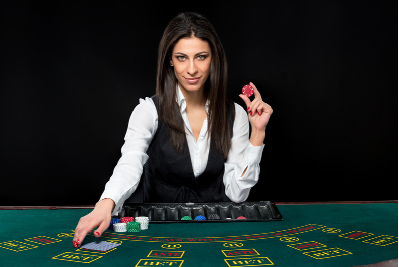 Female table game dealer